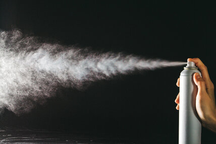 Spraying the aerosol from the spray