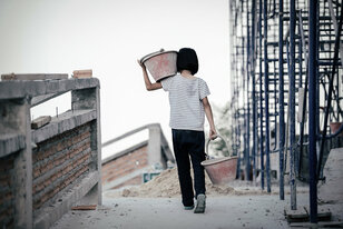 Children are forced to work in the construction area. Human righ